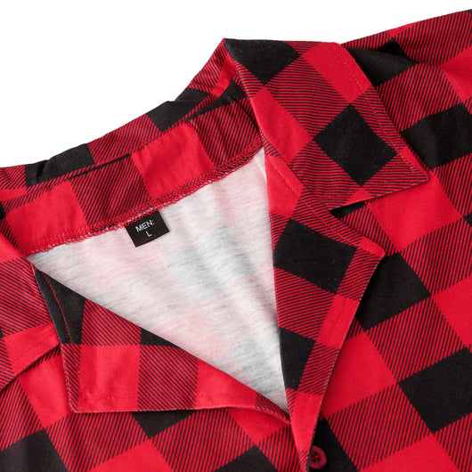 Baby in a red and black buffalo plaid long-sleeve pajama romper, viewed from the back with arms raised. - Image 33