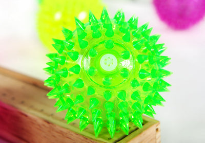 Four glowing sea urchin balls in neon pink, green, and yellow, with soft rubber spikes, for pets. - Image 5