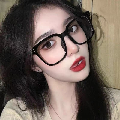 Full-frame trendy blue light blocking glasses with a transparent blue square frame and clear lenses. - Image 22