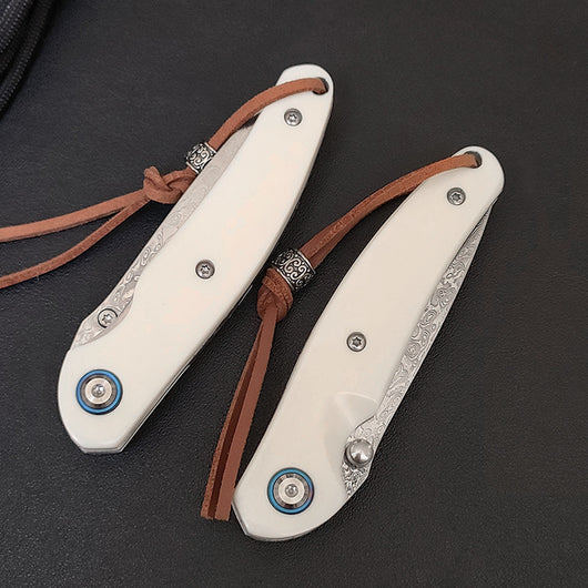 Cuchillo Plegable Acero Damasco para Aventuras al Aire Libre - Image 3