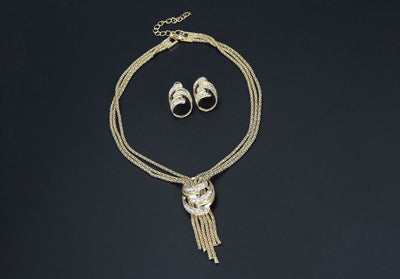Conjunto de Joyas Elegantes: Collar, Pulsera, Aretes y Anillo - Image 6