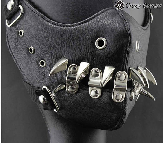 Black leather half-face mask with brass chains, spikes, and gear accents, featuring adjustable elastic straps. - Image 2