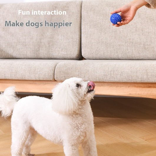 Red 65mm dog toy ball with a textured honeycomb surface, designed for vocalization, bite-resistance, and molar relief. - Image 4