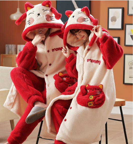 Family of four wearing matching red and cream coral velvet hooded pajamas with embroidered 'money' text and cute pockets. - Image 13