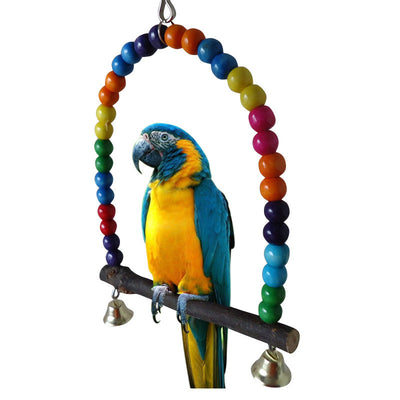 Blue and yellow macaw parrot on a colorful wooden bead swing with bells, designed for bird cages. - Image 6