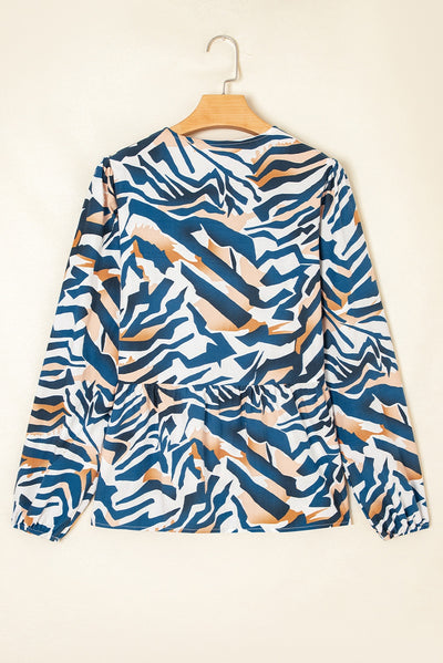 Blusa de Rayas Zebra Azul con Mangas Abullonadas - Image 7