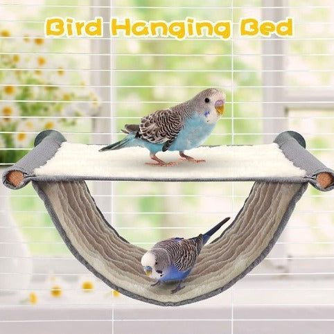 Gray and cream two-tier pet hammock with plush interior, hanging in a wire cage with three small birds. - Image 9
