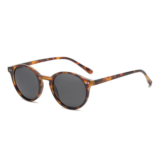 Round black full-rim sunglasses with vibrant blue polarized lenses, ideal for sun protection and fashion. - Image 7