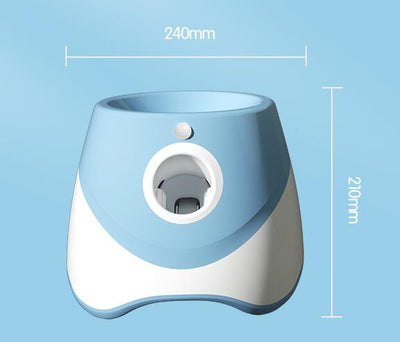 Two automatic dog ball throwers, one yellow and white, one green and white, on a wooden desk. - Image 6