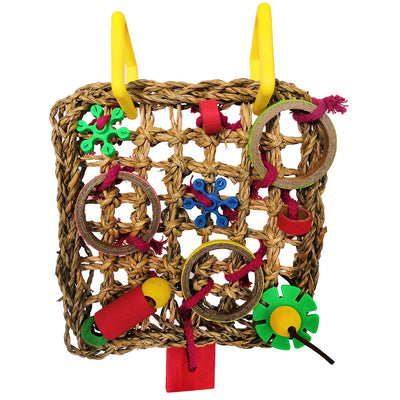 Colorful parrot bite toy with a woven grass mat, yellow plastic hangers, and various red, green, blue, and brown chewable components.