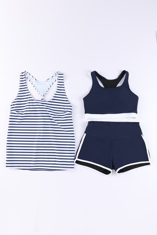 Women's navy blue three-piece high elastic bikini suit with racerback tankini top and swim shorts with white trim. - Image 42