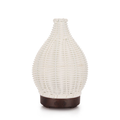 Mini ultrasonic aroma diffuser with a brown hollow rattan-style body and a white base, featuring control buttons. - Image 9