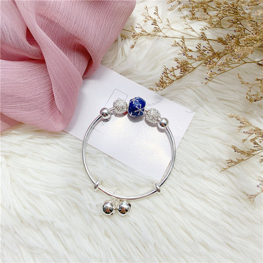 Pulsera Giratoria de Cobre con Cisne y Cuentas Plateadas - Image 3