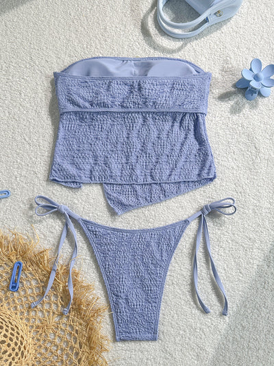 Light blue textured two-piece bikini with a strapless top and high-cut bottom with side ties and white bows. - Image 11