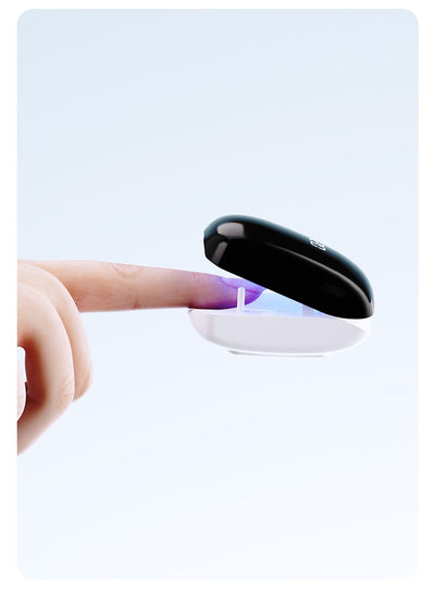 Black UV onychomycosis laser light lamp with a blue interior, partially open, for nail fungus cleaning and quick-drying. - Image 8