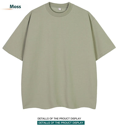 Moss green short-sleeve cotton t-shirt with a crew neck and a relaxed, oversized fit. - Image 24