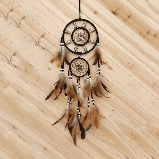 Bohemian dreamcatcher wind chime with black hoops, brown and tan feathers, and black and white beads. - Image 9
