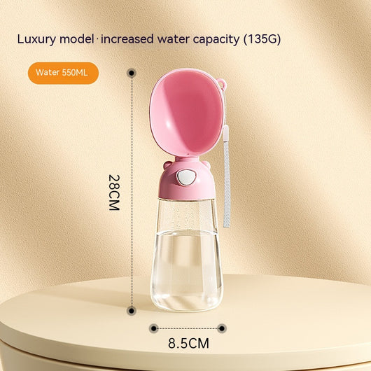 Yellow portable pet water bottle with clear reservoir, built-in drinking bowl, and wrist strap, 28cm tall. - Image 10