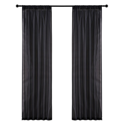 Sheer pink rod pocket curtain hanging on a black curtain rod, offering light transmission for a modern room. - Image 16