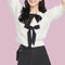 Pantalón Tejido con Detalles Cutout y Moño
