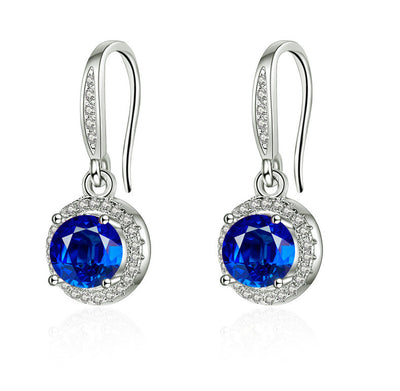 Aretes Moissanita Redondos de Cuatro Puntas - Image 23