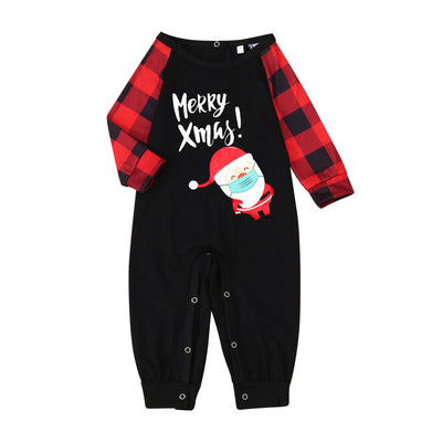 Family matching Christmas pajamas with black tops, red plaid sleeves, and Santa wearing a mask, paired with red plaid pants. - Image 2