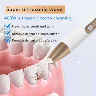 White and gold ultrasonic tooth cleaner with a pointed metal tip, standing in a white charging base. - Image 12