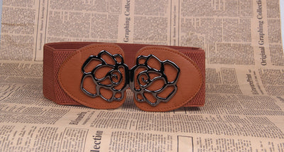 Red elastic women's belt featuring a prominent black alloy rose-shaped double buckle, suitable for various outfits. - Image 4