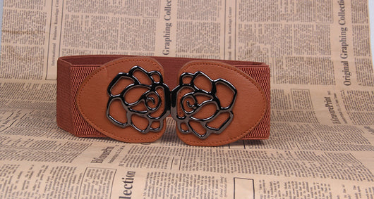 Red elastic women's belt featuring a prominent black alloy rose-shaped double buckle, suitable for various outfits. - Image 4