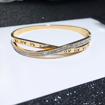 Pulsera de Acero Titanio con Baño de Oro 18k - Diseño Cruz
