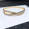 Pulsera de Acero Titanio con Baño de Oro 18k - Diseño Cruz