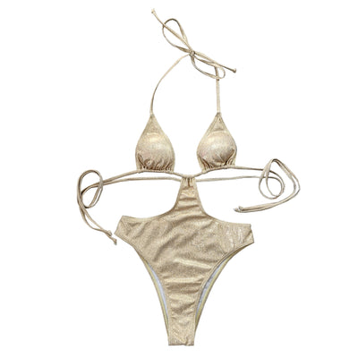 Woman wearing a shimmering gold one-piece swimsuit with a halter neck, crisscross straps, and stylish cut-out details. - Image 20