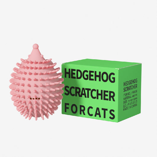 Lime green hedgehog-shaped cat toy with soft spikes, next to its matching green packaging box. - Image 4