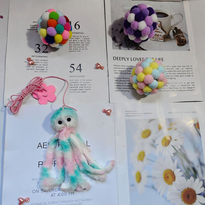 Purple plush cat teaser toy with googly eyes, elastic strings, and a pink flower attachment, resembling an octopus. - Image 4