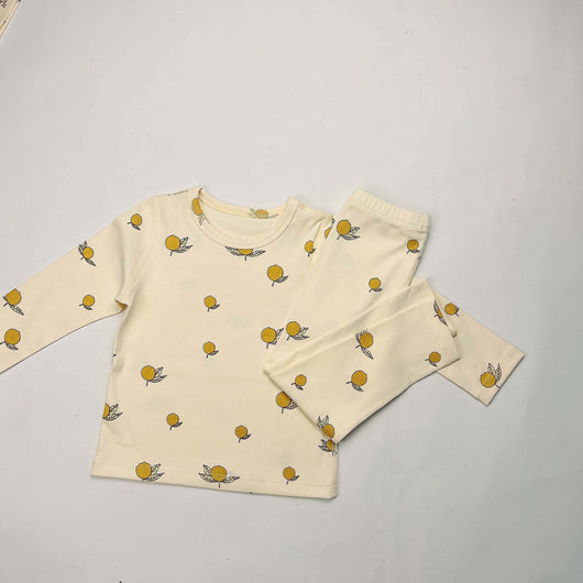 Light yellow infant long-sleeved pajama set with milk bottle and cookie print, suitable for homewear. - Image 14