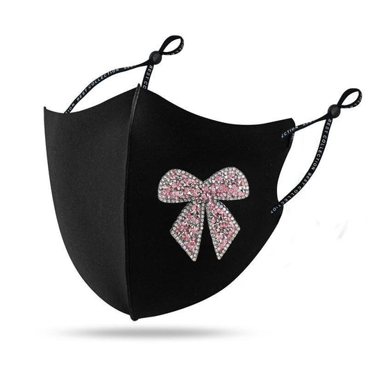 Black cloth face mask with a sparkling red and silver rhinestone bow design and adjustable ear loops. - Image 7