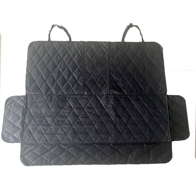 Black quilted car seat cover for dogs, shown with a golden retriever, protecting the rear seat from water and dirt. - Image 6
