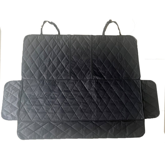 Black quilted car seat cover for dogs, shown with a golden retriever, protecting the rear seat from water and dirt. - Image 6