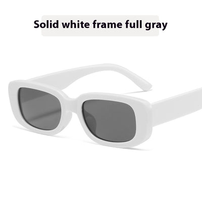 Children's small frame oval sunglasses with a solid white PC frame and brown AC lenses for UV protection. - Image 12