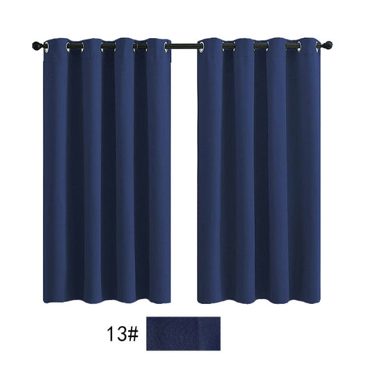 Pair of navy blue outdoor waterproof curtains with silver grommets on a black rod, against a white background.