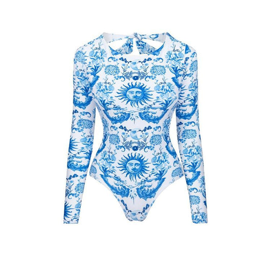 White one-piece swimsuit with a blue sun and intricate floral pattern, featuring a scoop neck and wide straps. - Image 8