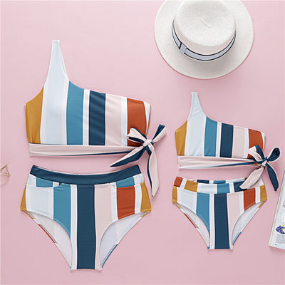 One-shoulder striped parent-child bikini set with colorful vertical stripes, featuring an adult and child size. - Image 9