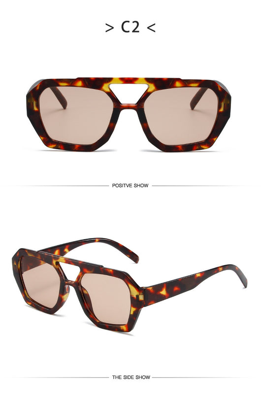 Minimalist square fashion sunglasses with a tortoiseshell frame and light brown lenses, angled view. - Image 26