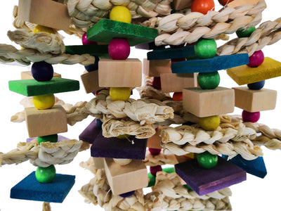Colorful bird toy made of natural wood blocks, beads, and corn husk strips, with a red and green macaw. - Image 9