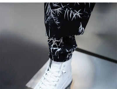 Pantalones Harem Sueltos de Seda Helada con Estampado Floral para Hombre - Image 9