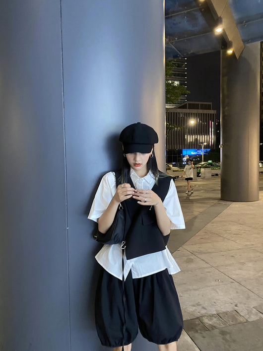 Chaleco Negro Asimétrico con Diseño Contemporáneo para Mujer - Image 13