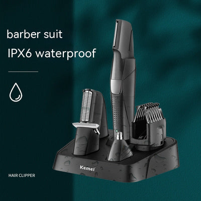 Black Kemei electric hair clipper grooming kit with multiple attachments and charging stand on a white background.