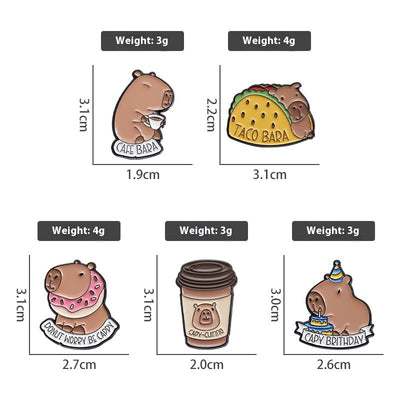 Cute capybara enamel brooch wearing a pink donut with sprinkles and "DONUT WORRY BE CAPPY" text. - Image 40