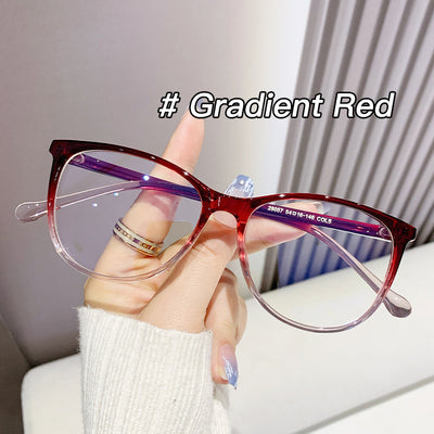 Black full-frame round anti-blue light glasses held by a hand with a gold ring and light blue gradient nails. - Image 10