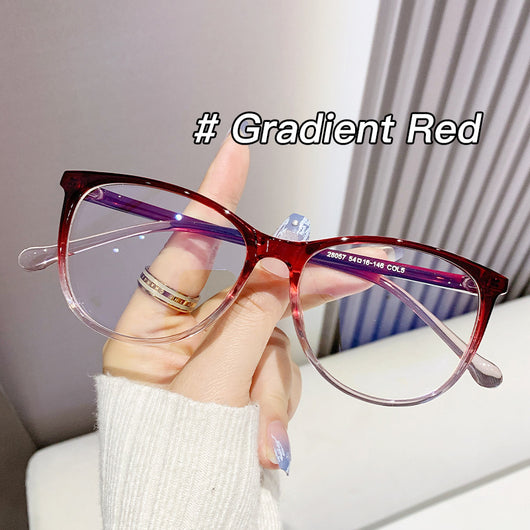 Black full-frame round anti-blue light glasses held by a hand with a gold ring and light blue gradient nails. - Image 10